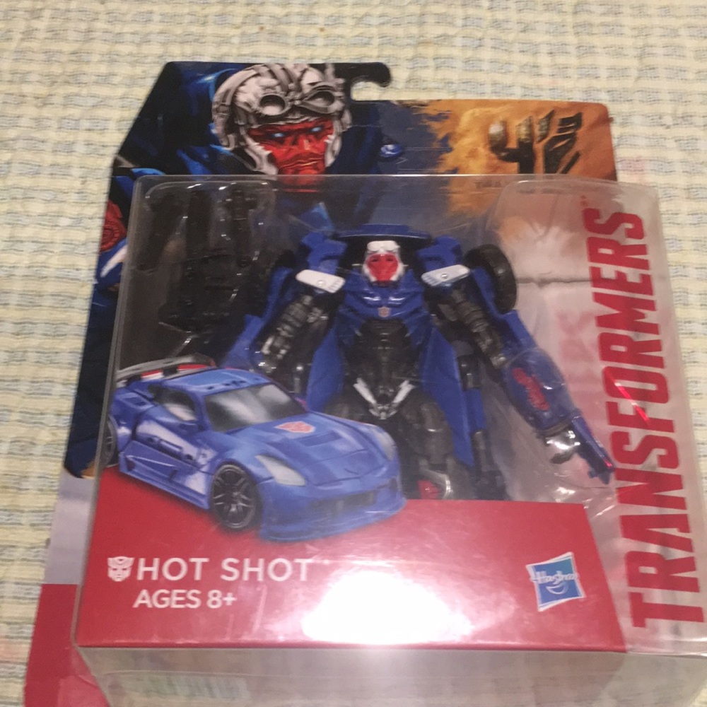 Transformers Hot shot Age of Extinction Corvette NEW Changes in 12 Steps Hasbro